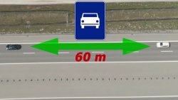 samochody na drodze i strzałka z wymaganą odległością