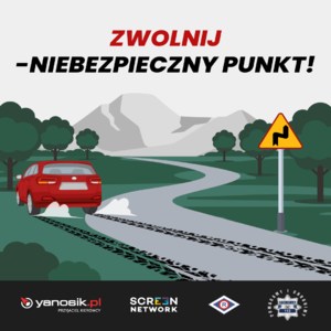 na zdjęciu plakat samochód na drodze i napis zwolnij-niebezpieczny punkt