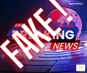 na zdjęciu plakat z napisem fake news