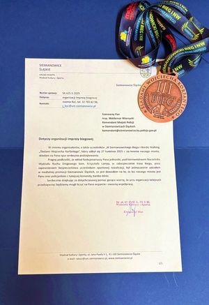 na zdjęciu podziękowania i medal